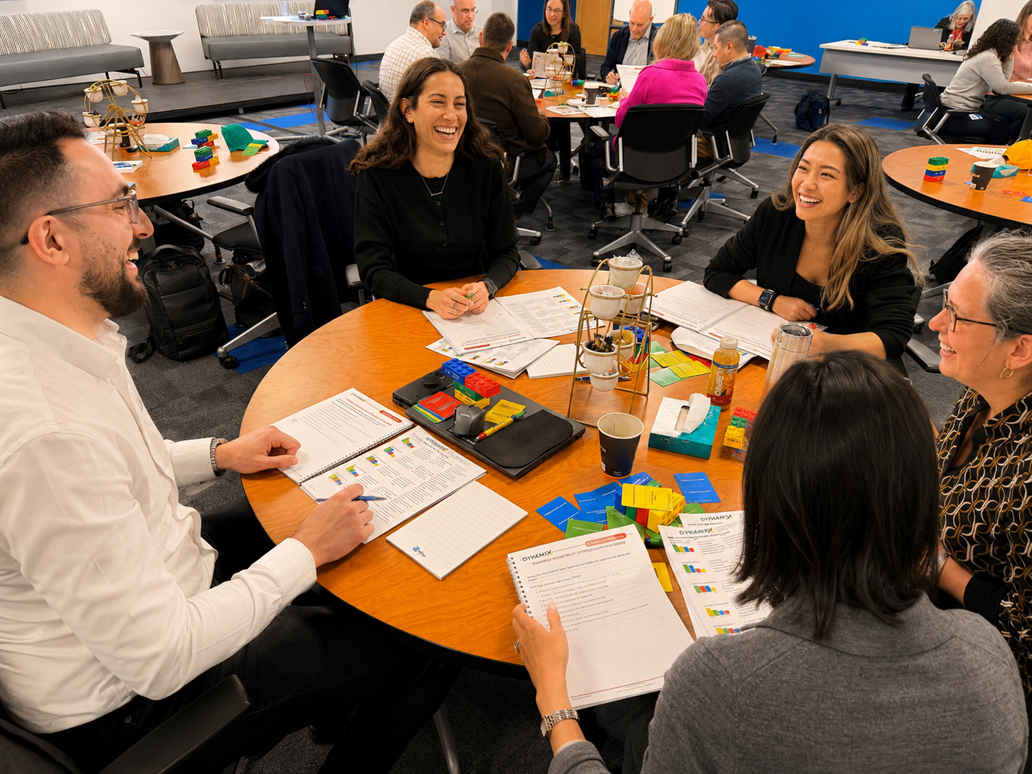Clients enjoying a collaborative session around a table